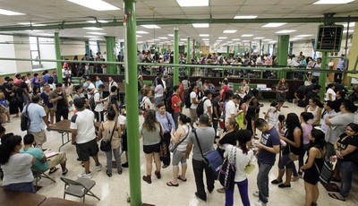 
              People fill the hall of St. Mary